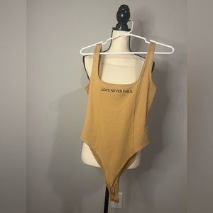 Tan body suit Size:Small